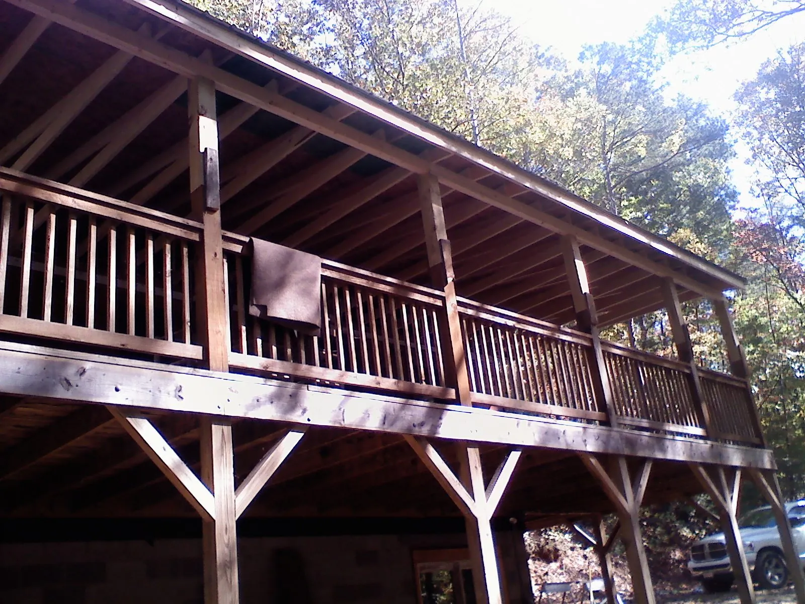Timber framing under a new elevated porch and deck in Great Valley